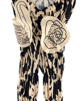 Pantalon encauchado print aves