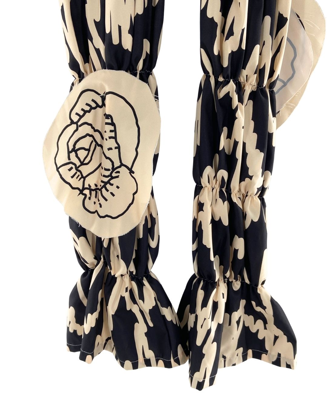 Pantalon encauchado print aves