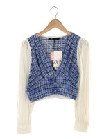 Blusa en tweed