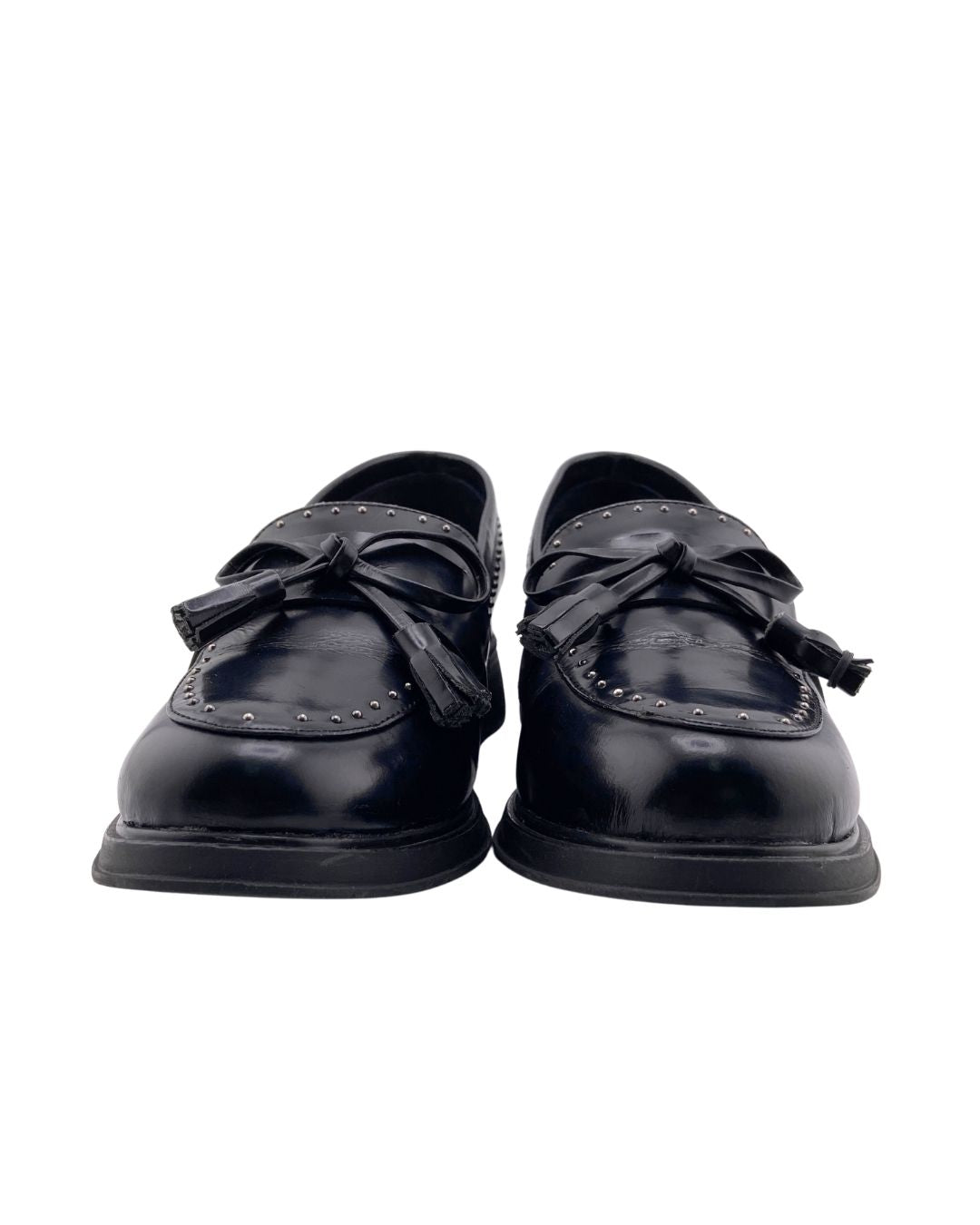 Mocasines en cuero con taches