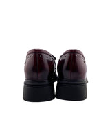 Mocasines en cuero con taches