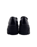Loafers en cuero con taches
