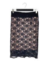 Falda midi rigida en blonda