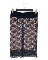 Falda midi rigida en blonda