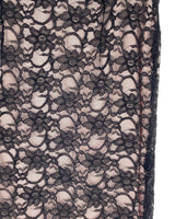 Falda midi rigida en blonda