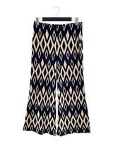 Pantalon licrado flare print