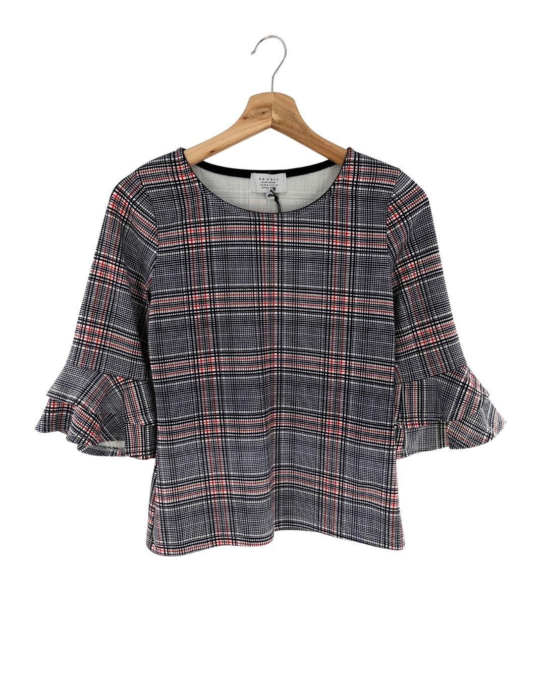 Blusa con vuelos en puños