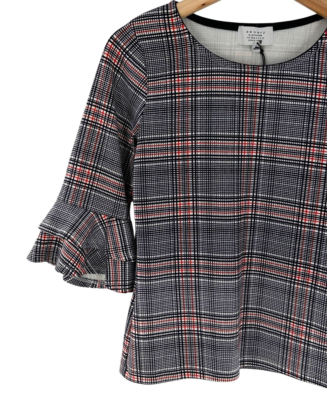 Blusa con vuelos en puños