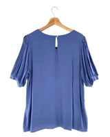 Blusa manga globo con textura