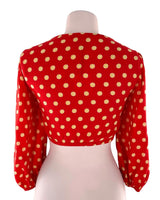 Blusa crop manga larga