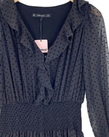 Vestido midi encauchado
