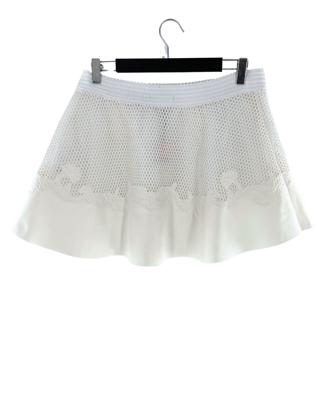 Falda mini en mesh geometrico