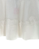 Falda mini en mesh geometrico