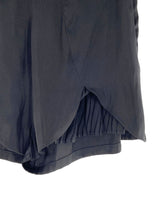 Short rigido mini con detalles