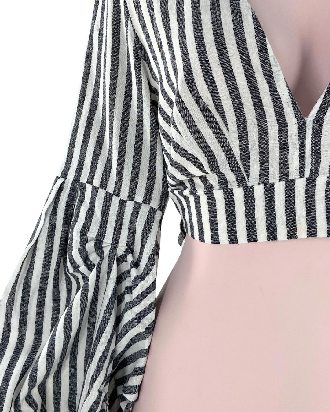 Blusa mangas drapeadas