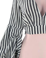Blusa mangas drapeadas
