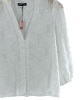 Camisa manga larga con flores
