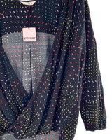 Blusa cruzada manga larga