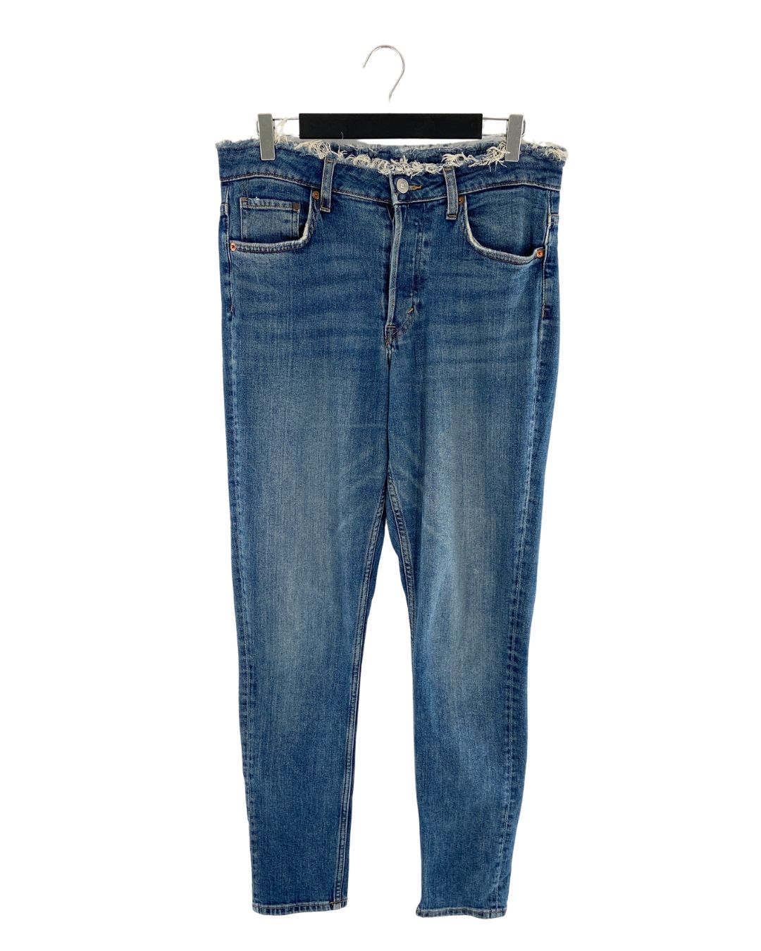 Skinny jean abotonado