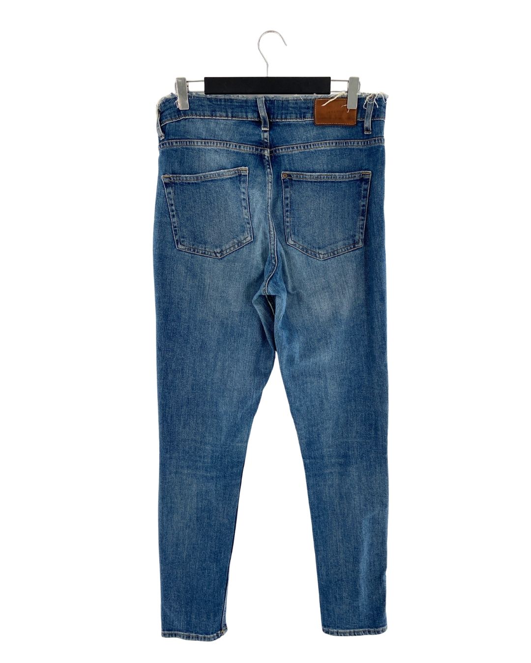 Skinny jean abotonado