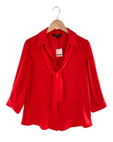 Blusa manga larga con lazo
