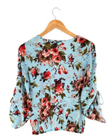 Blusa cruzada satinada print